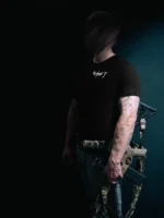 the trace mockup clothing featuring their T logo on the chest and a weapon on the hand