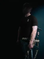 the trace mockup clothing featuring their T logo on the chest and a weapon on the hand