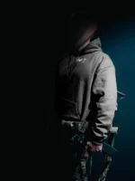 the trace mockup clothing featuring their T logo on the chest and a weapon on the hand