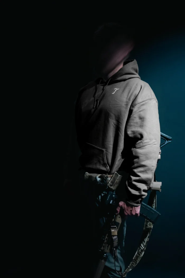 the trace mockup clothing featuring their T logo on the chest and a weapon on the hand