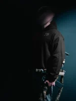 the trace mockup clothing featuring their T logo on the chest and a weapon on the hand