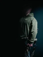 the trace mockup clothing featuring their T logo on the chest and a weapon on the hand