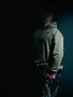 the trace mockup clothing featuring their T logo on the chest and a weapon on the hand