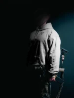 the trace mockup clothing featuring their T logo on the chest and a weapon on the hand