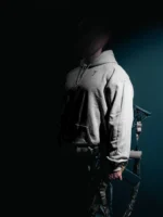 the trace mockup clothing featuring their T logo on the chest and a weapon on the hand