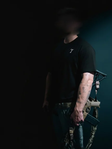 the trace mockup clothing featuring their T logo on the chest and a weapon on the hand