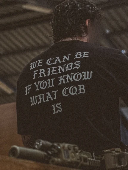 the trace oversized shirt with a text saying we can be friends if you know what cqb is